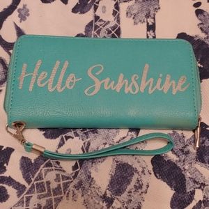 Wallet with wrist strap